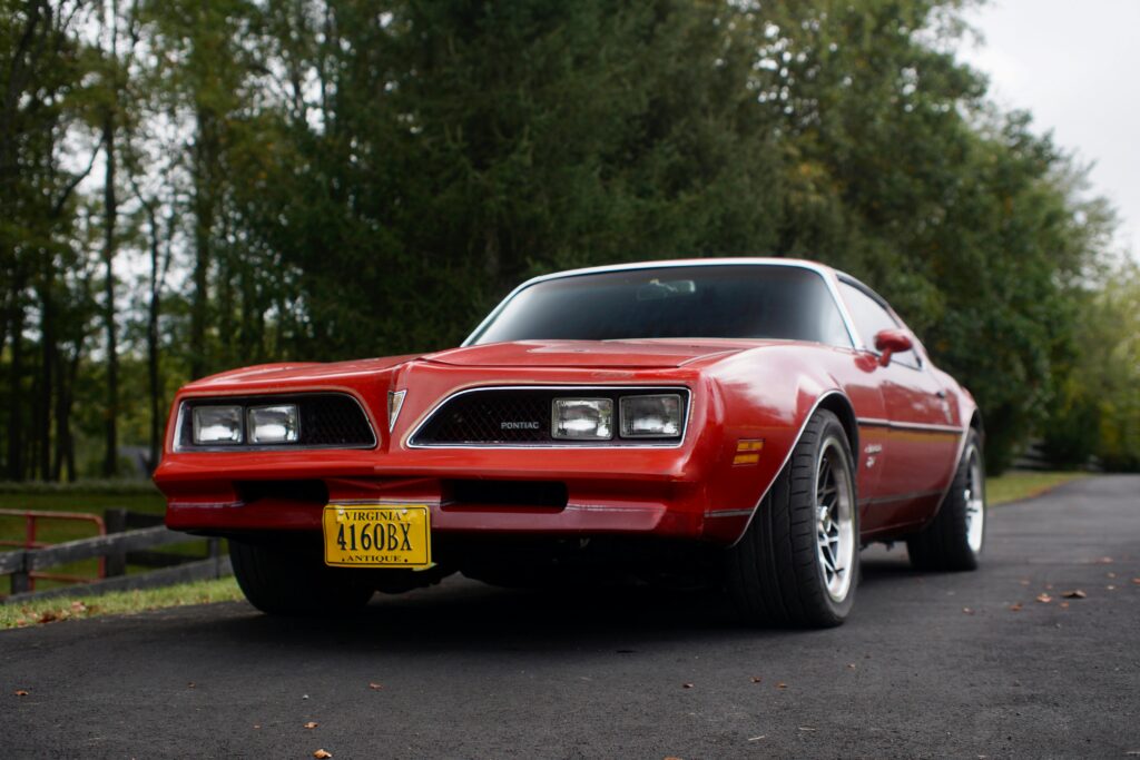 pontiac firebird sitting on the street